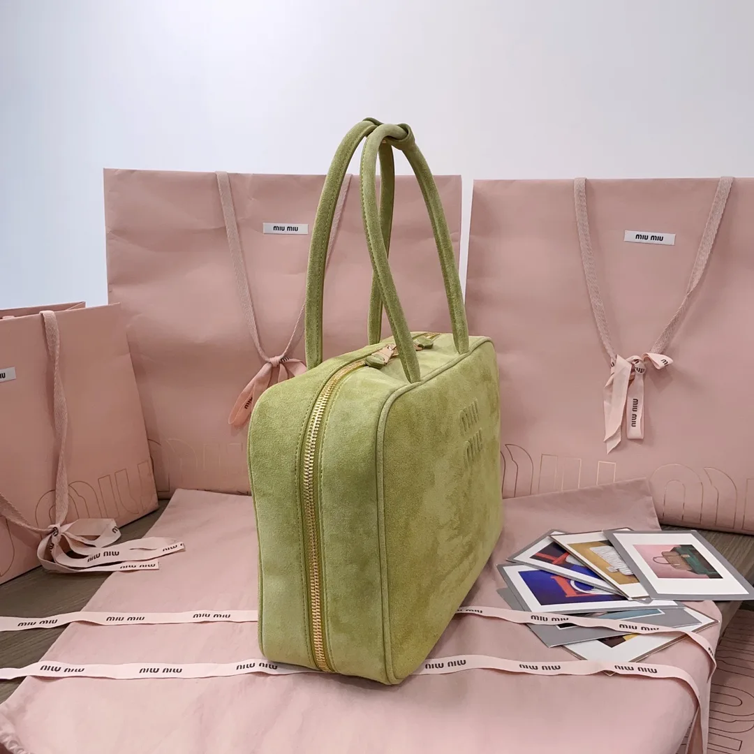 Miu Miu Canvas and Leather Crossbody Bag product photo from LabelPicks