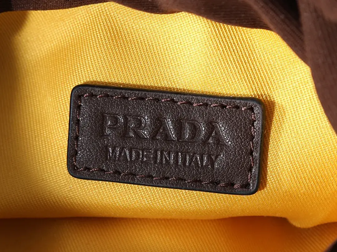 Prada Woven Leather Bucket Bag product photo from LabelPicks