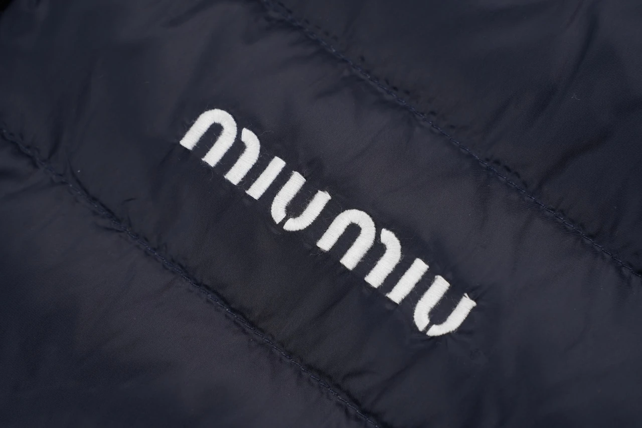 Miu Miu Navy Logo Quilted Down Vest product photo from LabelPicks
