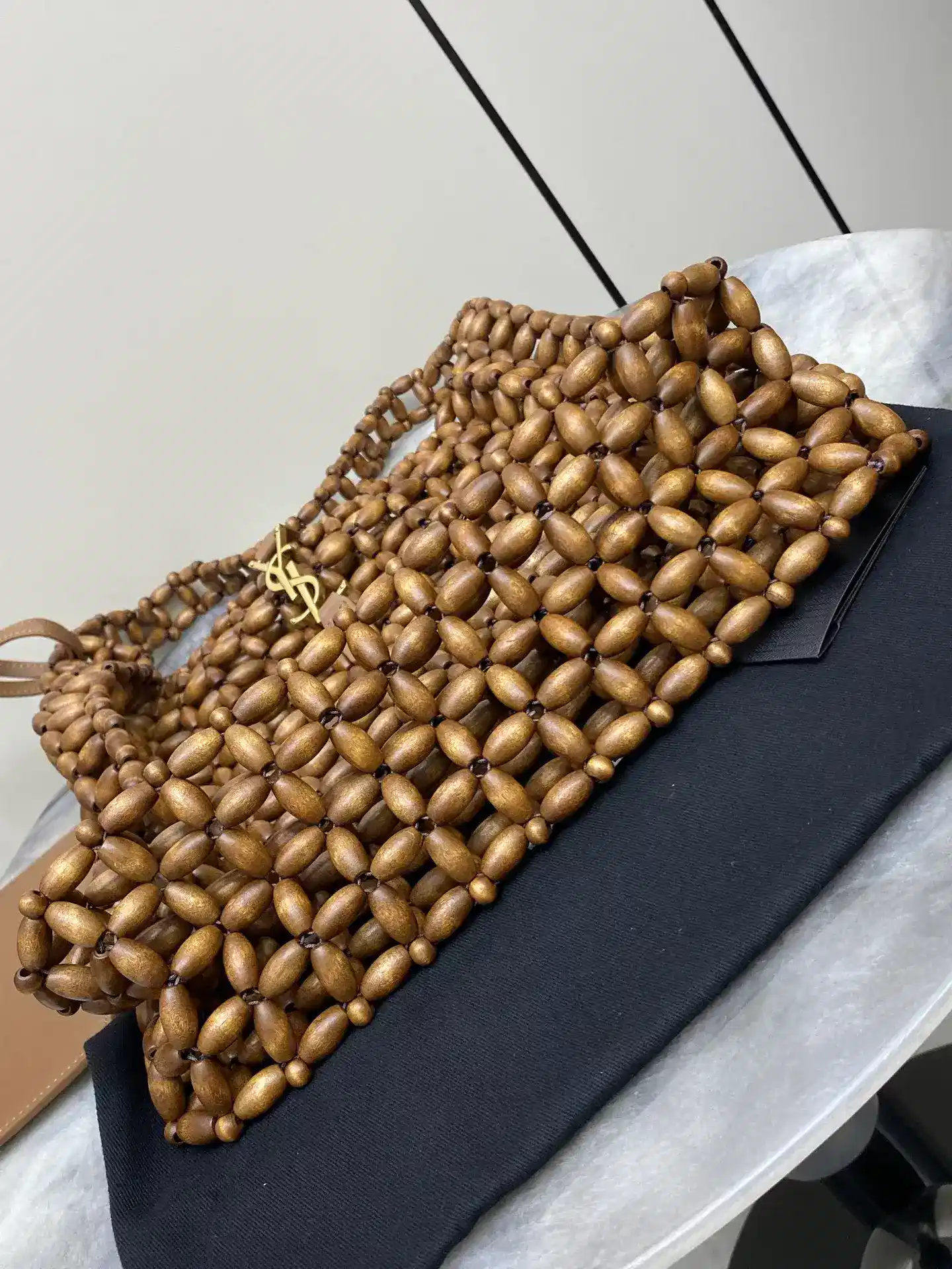 Saint Laurent Woven Leather Shoulder Bag product photo from LabelPicks