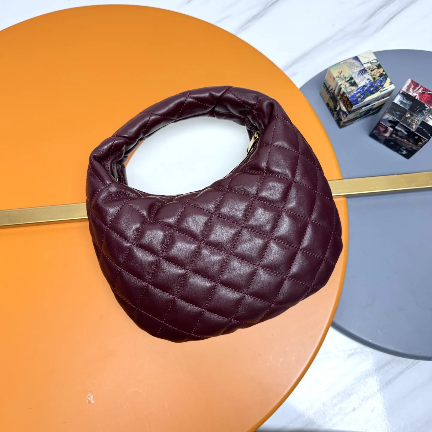 Saint Laurent Icare Burgundy Lambskin Hobo Bag product photo from LabelPicks