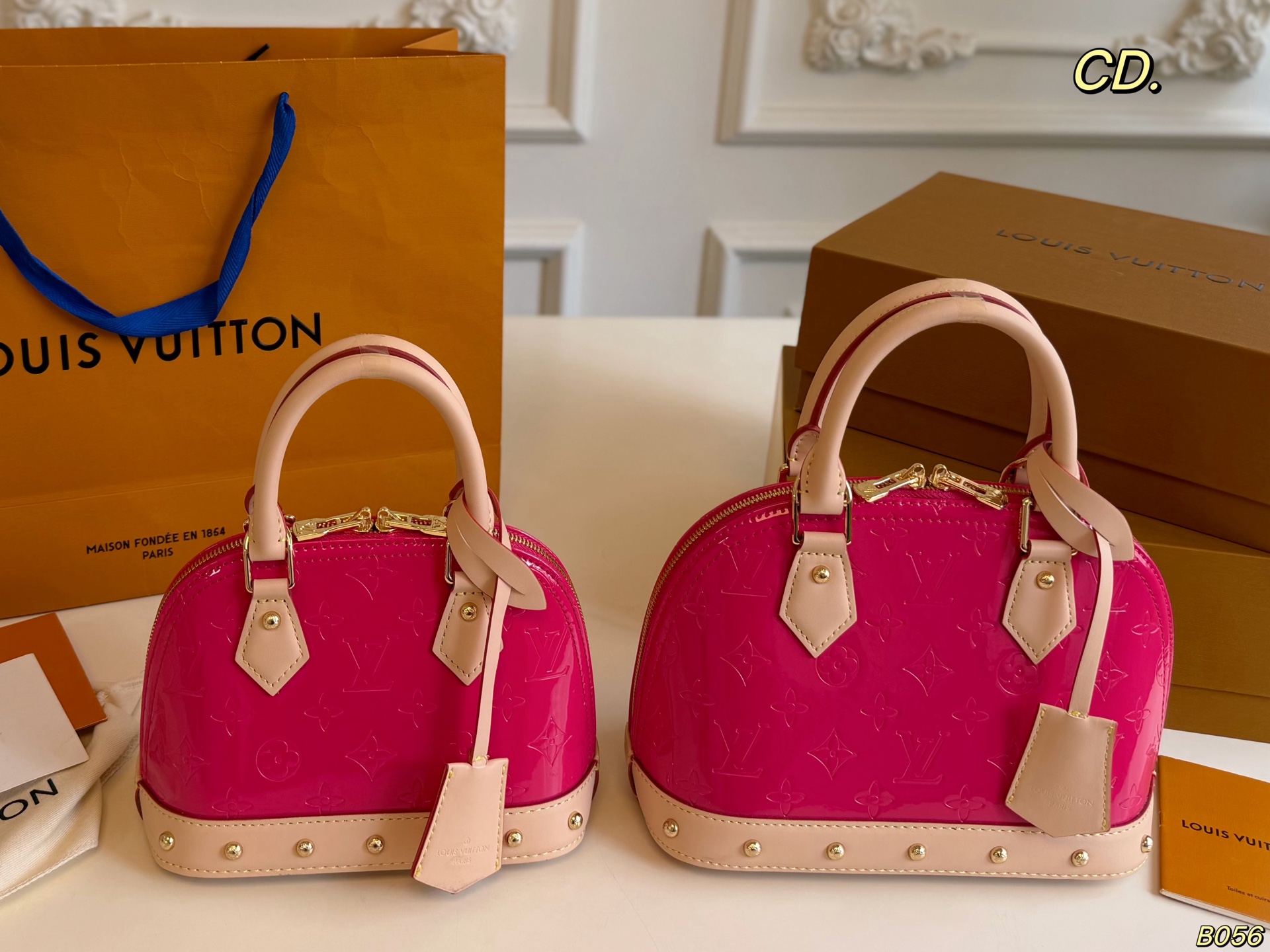 LV Alma patent leather shell bag