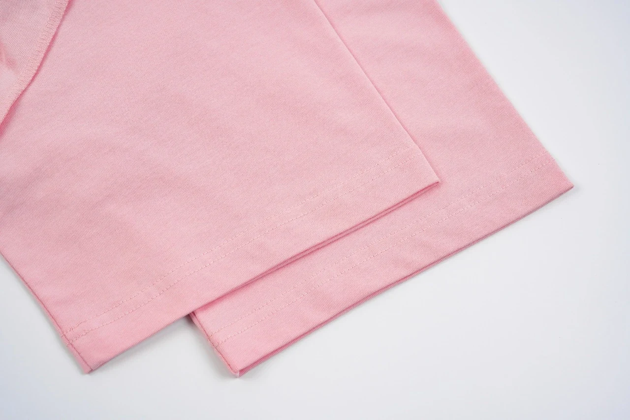 Louis Vuitton Pink Embossed Logo T-Shirt product photo from LabelPicks