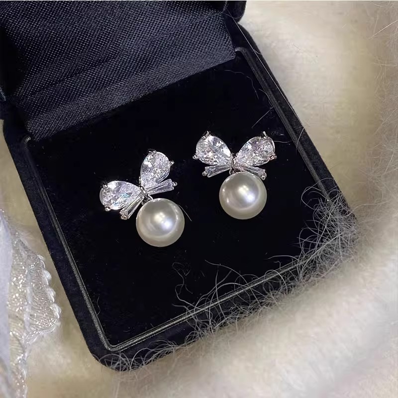 S925 sterling silver beaded butterfly knot earrings, versatile, stylish, minimalist, and with a unique, high-end aesthetic