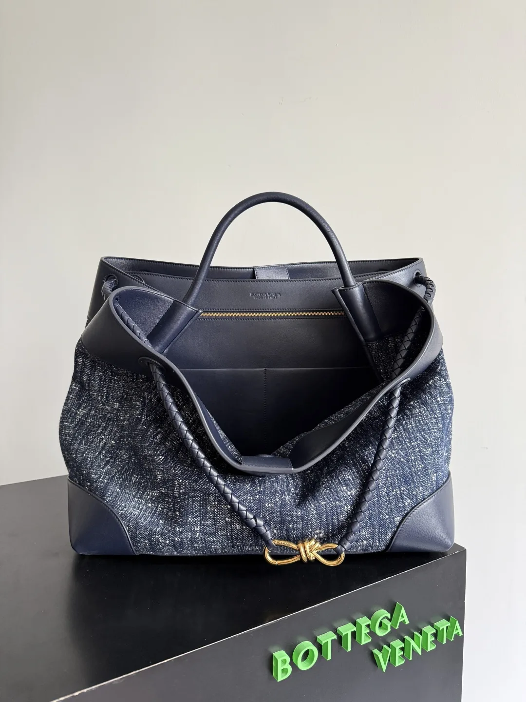 Bottega Veneta Andiamo Blue Intrecciato Woven Leather Top Handle Bag product photo from LabelPicks