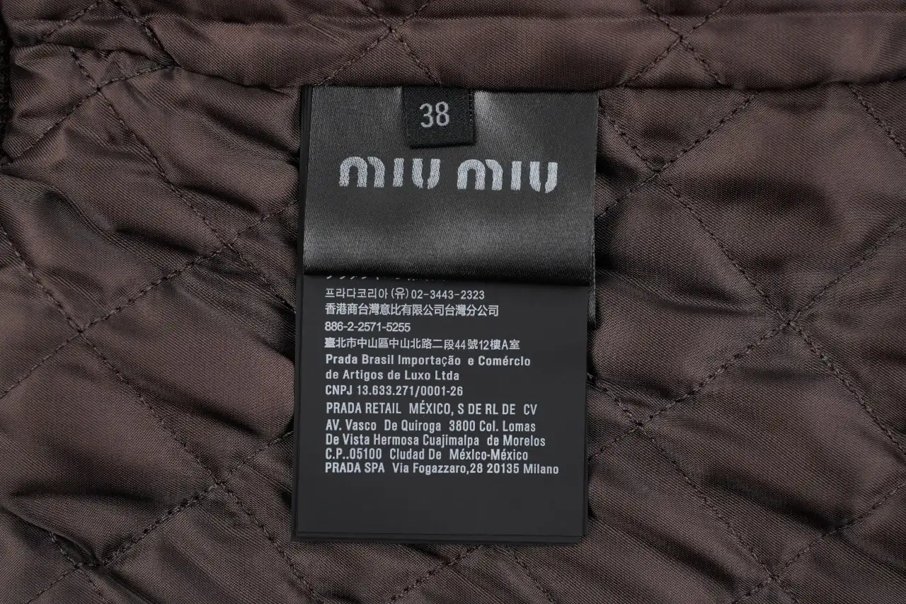 Miu Miu Dark Green Check Logo Padded Jacket product photo from LabelPicks