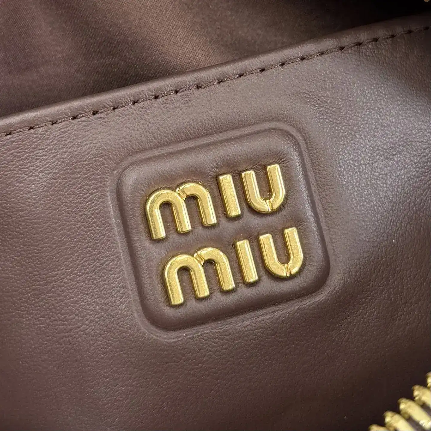 Miu Miu Calfskin Matelasse Top Handle Bag product photo from LabelPicks