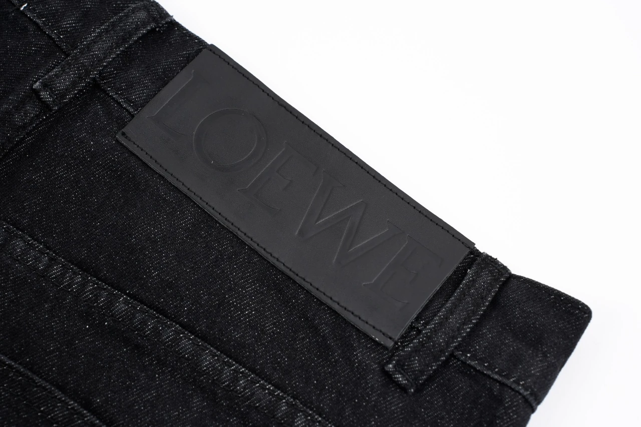 LOEWE Black Denim Jeans with Knee Anagram Detail product photo from LabelPicks