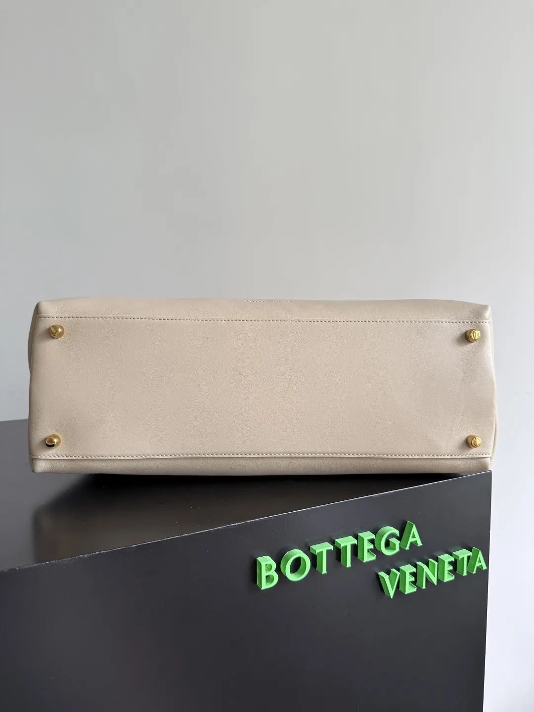 Bottega Veneta Knot Intrecciato Woven Leather Top Handle Bag product photo from LabelPicks