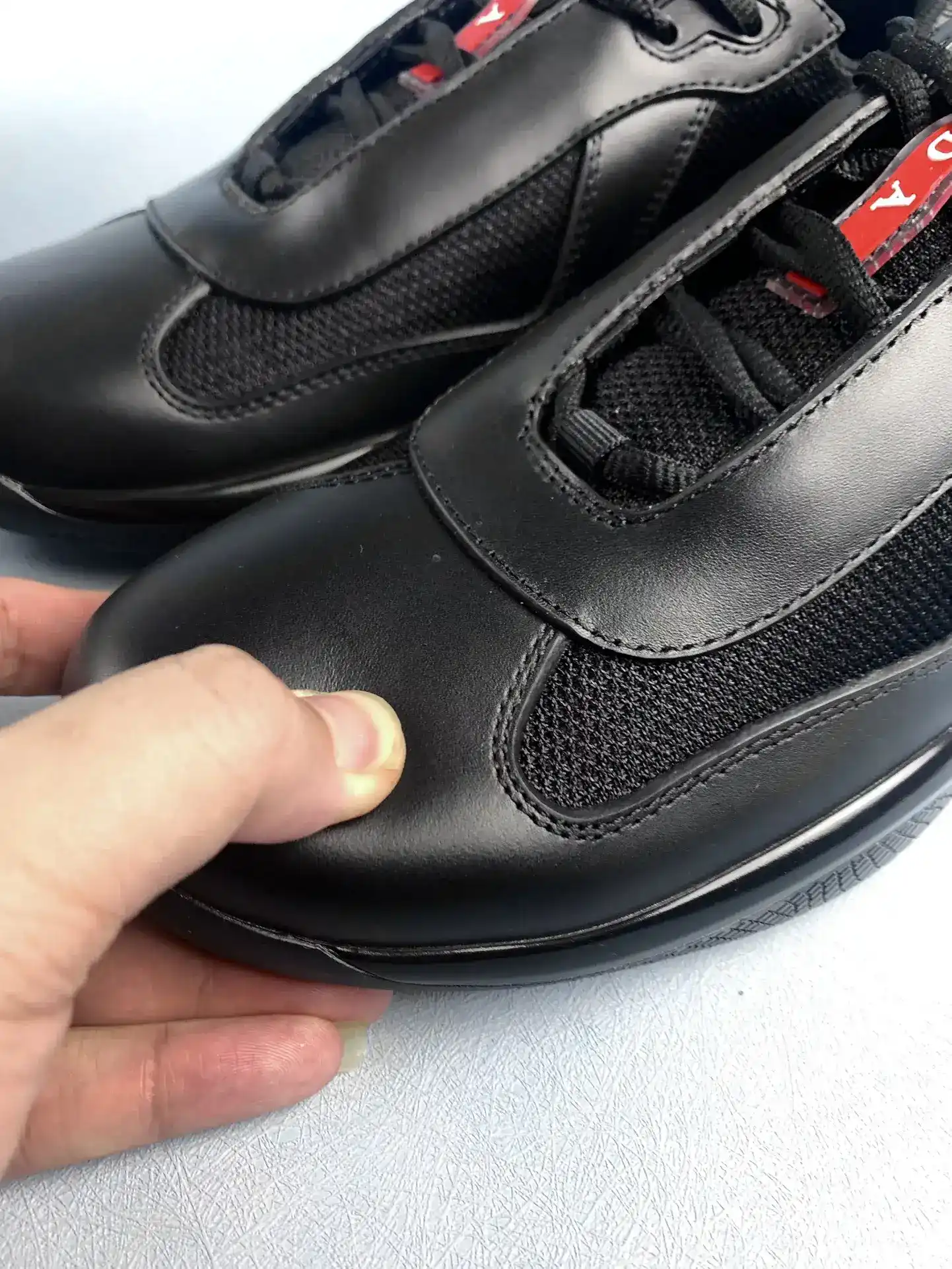 Prada America's Cup fabric and leather sneakers product photo from LabelPicks