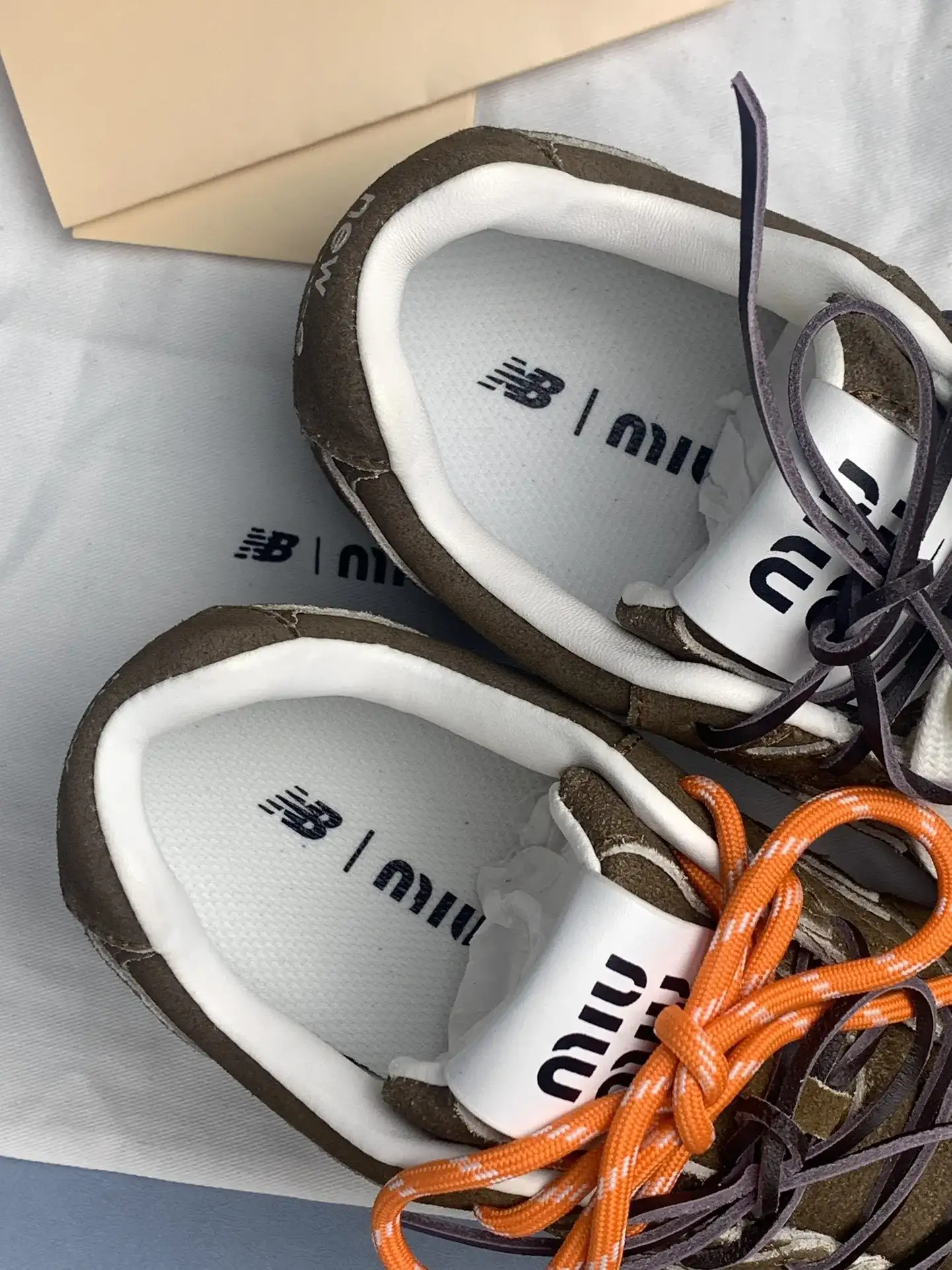 New Balance X Miu Miu 530 SL suede sneakers product photo from LabelPicks