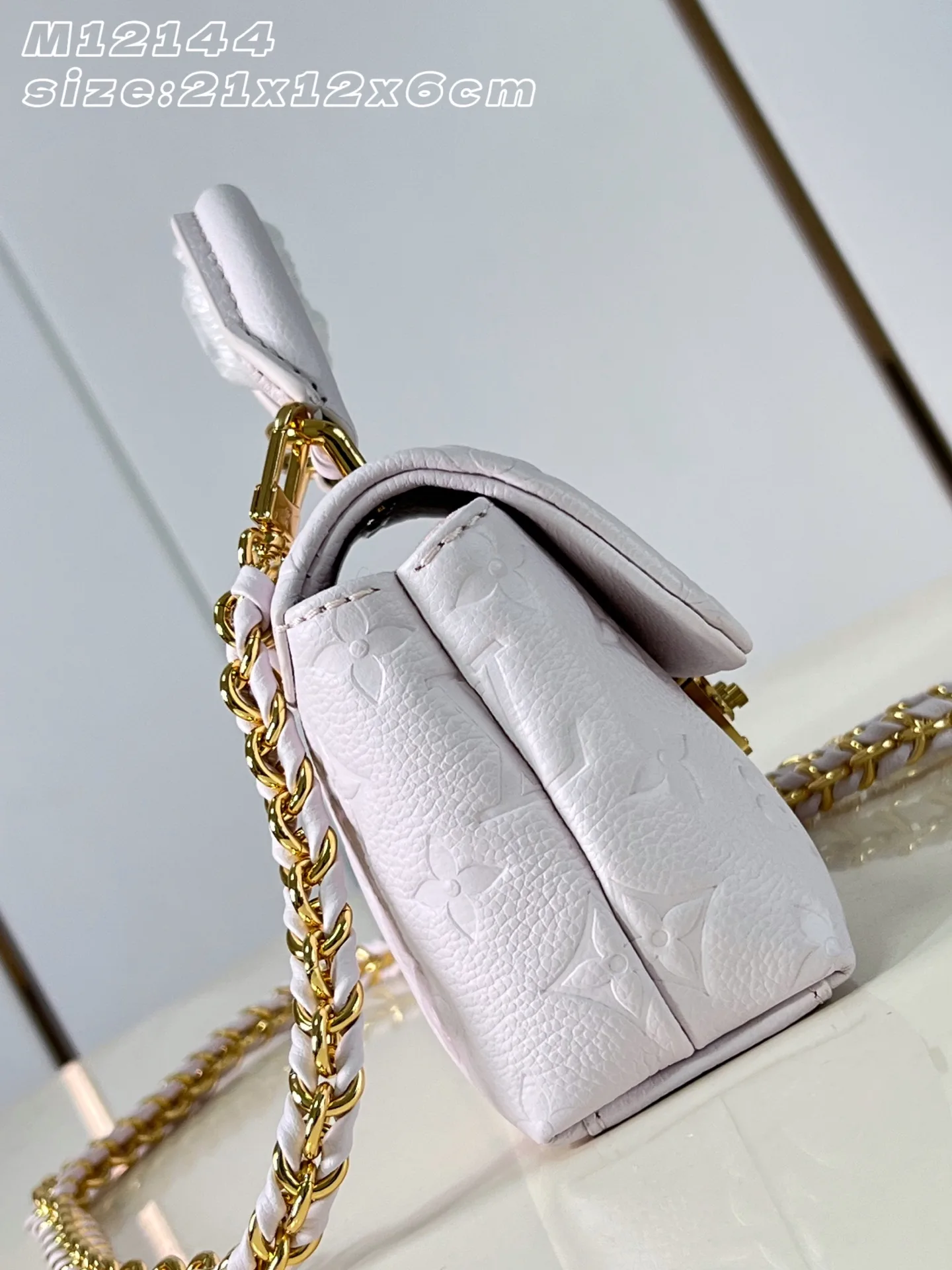 Louis Vuitton Madeleine Woven Leather Top Handle Bag product photo from LabelPicks