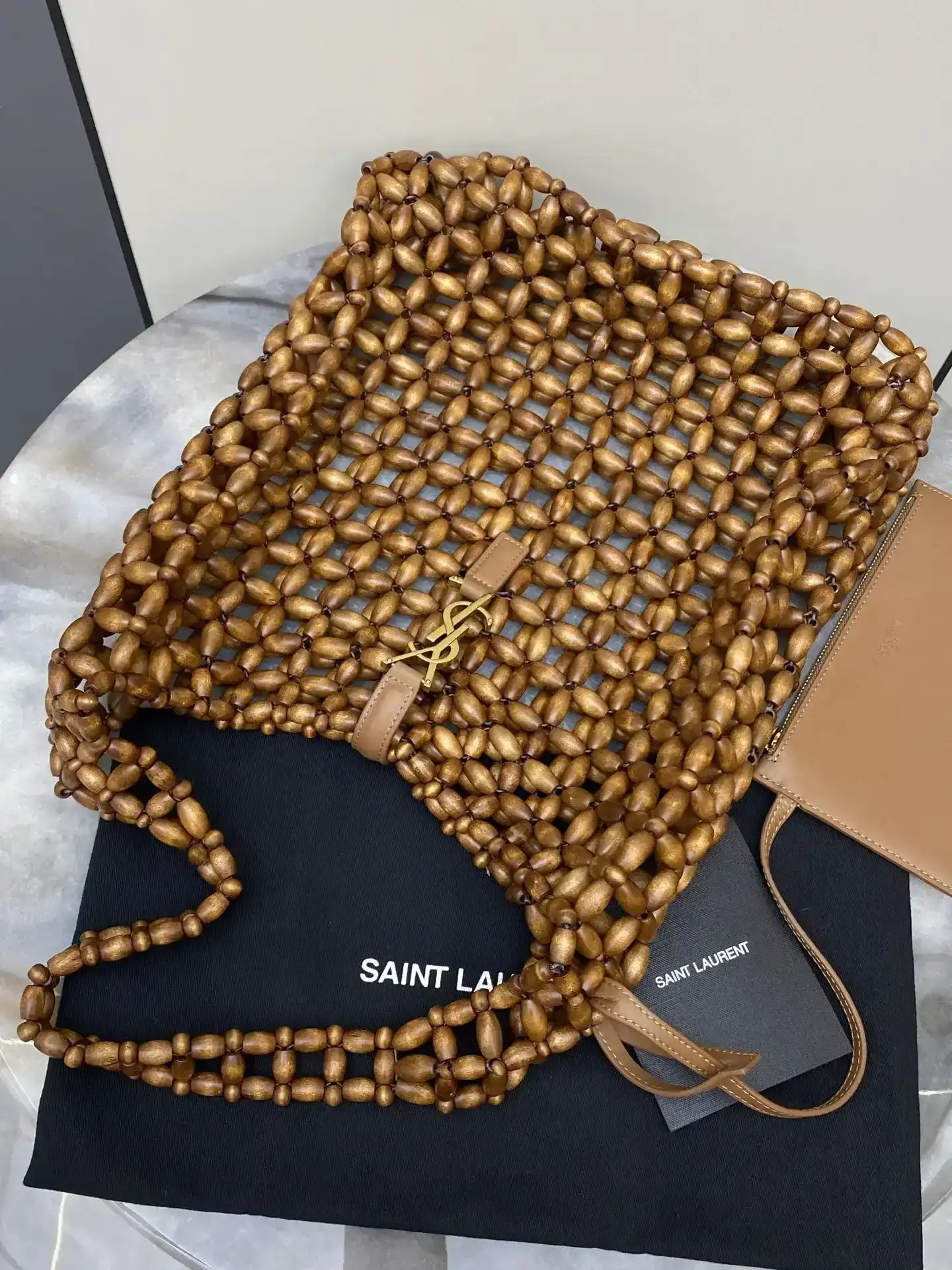 Saint Laurent Woven Leather Shoulder Bag product photo from LabelPicks