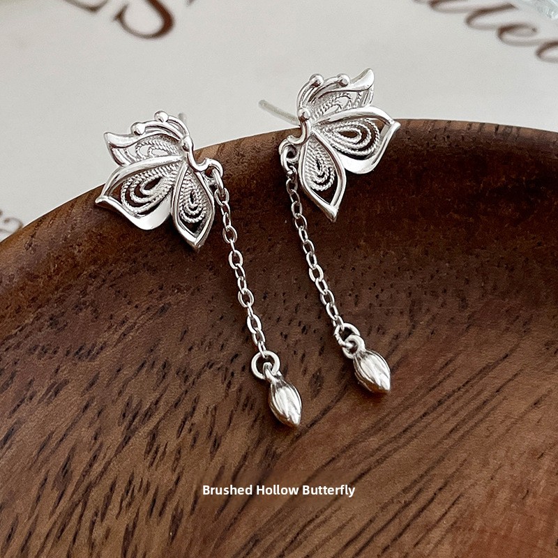 999 pure silver, brushed finish, hollow butterfly earrings, a delicate and luxurious design, long tassel earrings, perfect for summer, and a trendy, Instagram-worthy style