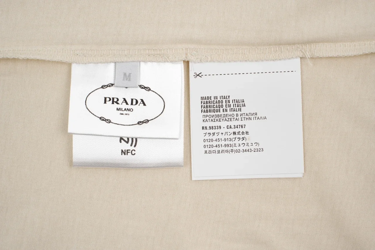 Prada Off-White Distressed Small Logo Triangle T-Shirt product photo from LabelPicks