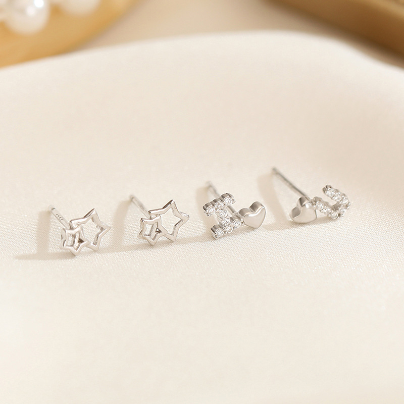 925 sterling silver hollow star earrings for women, featuring a heart-shaped IOU design and delicate cubic zirconia accents, a small and simple, trendy piece of jewelry