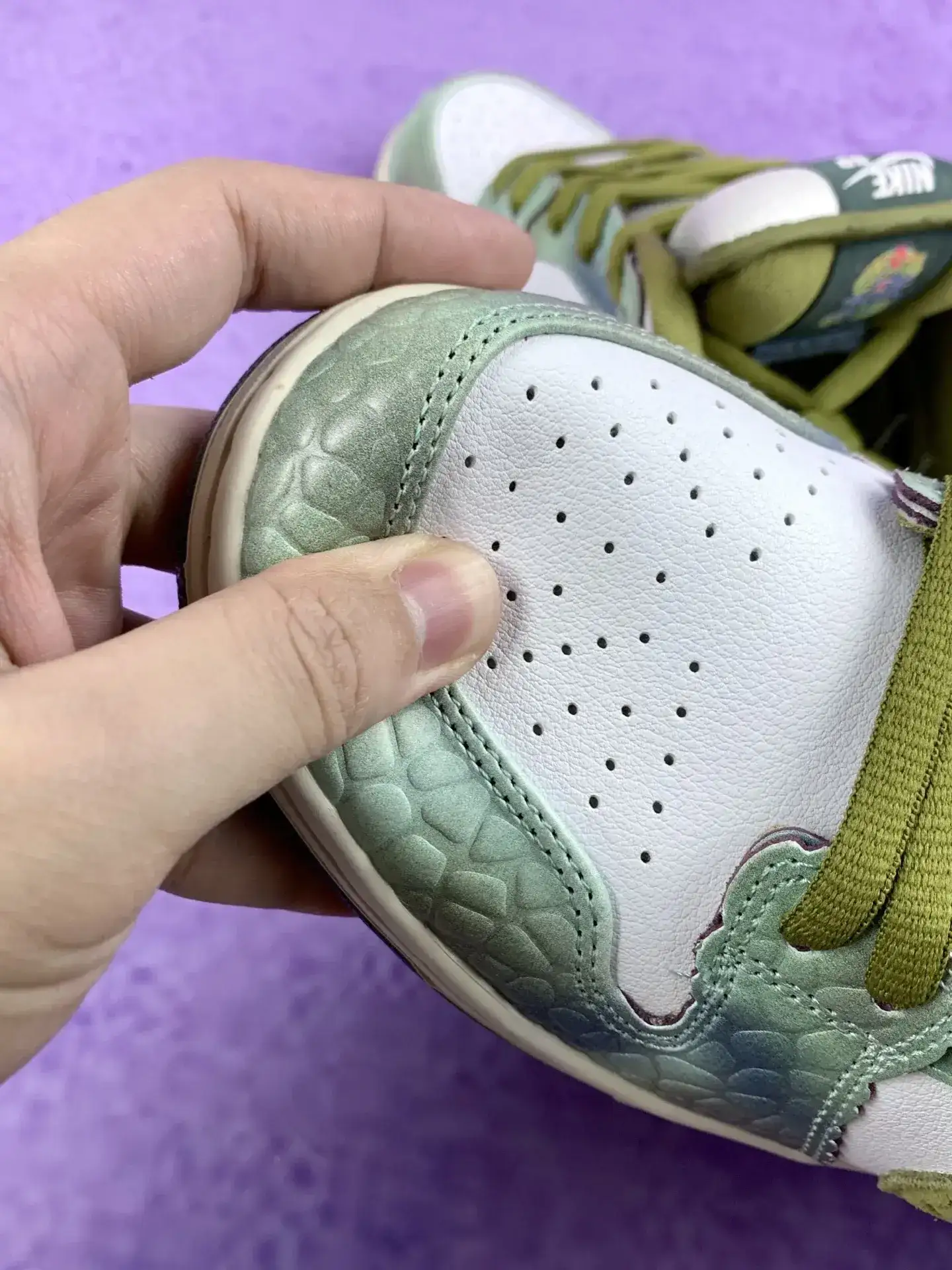 Alexis Sablone x Nike SB Dunk Low Pro “Chameleon” - Oil Green/Desert Moss/White product photo from LabelPicks