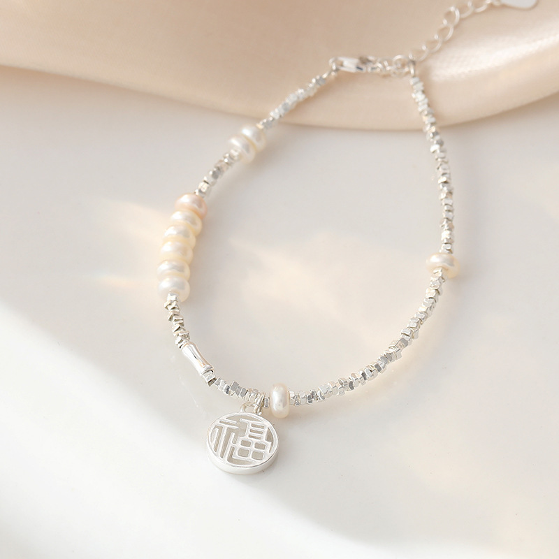 Fuxi brand silver and pearl bracelet for women, made of 925 sterling silver, featuring a new Chinese style design, symbolizing peace and good fortune throughout the year, a traditional Chinese jewelry piece