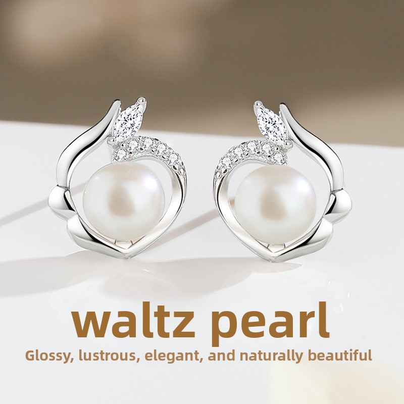 Original asymmetrical heart-shaped pearl earrings, featuring a geometric design in sterling silver, exuding a sophisticated and elegant aura, perfect as a gift for Women's Day