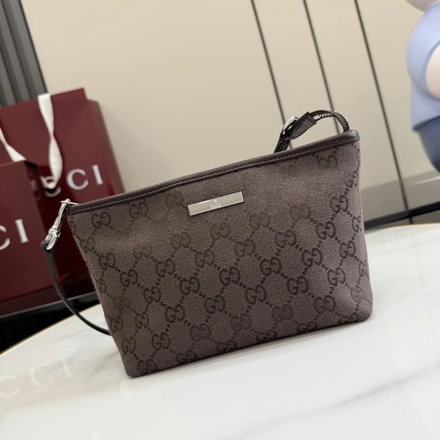 Gucci Brown Generation Canvas and Leather Clutch product photo from LabelPicks