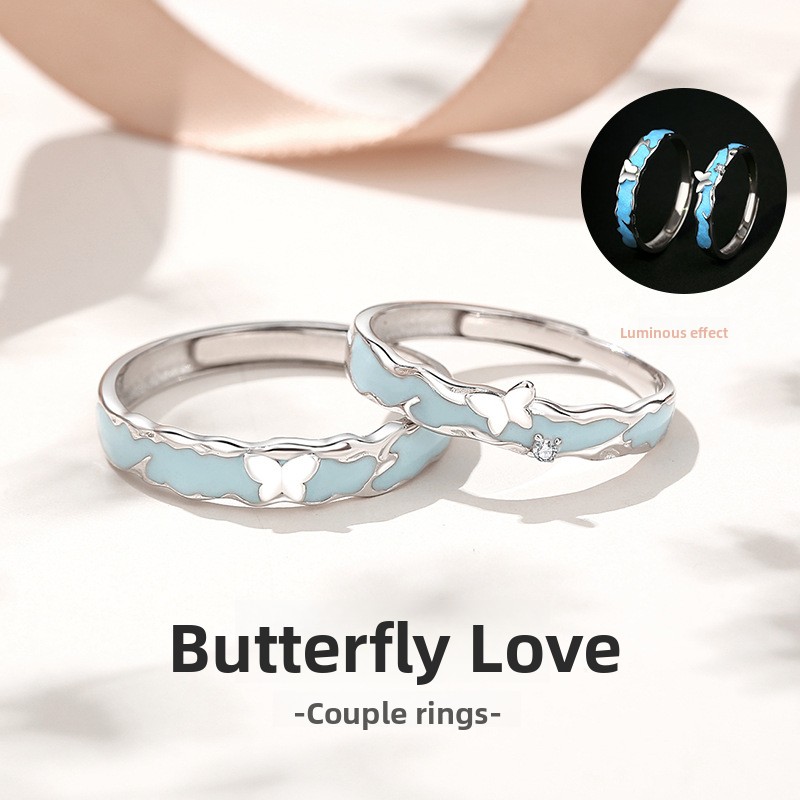 Original design, a pair of butterfly-themed rings for couples, made of 925 sterling silver, featuring a minimalist and unique style, with enamel and resin accents, and a luminous effect in the dark