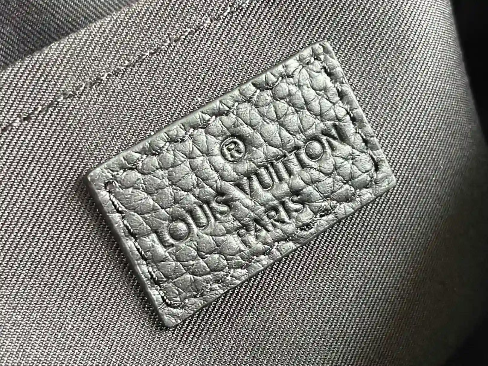 Louis Vuitton Grained Leather Keepall Crossbody Bag product photo from LabelPicks