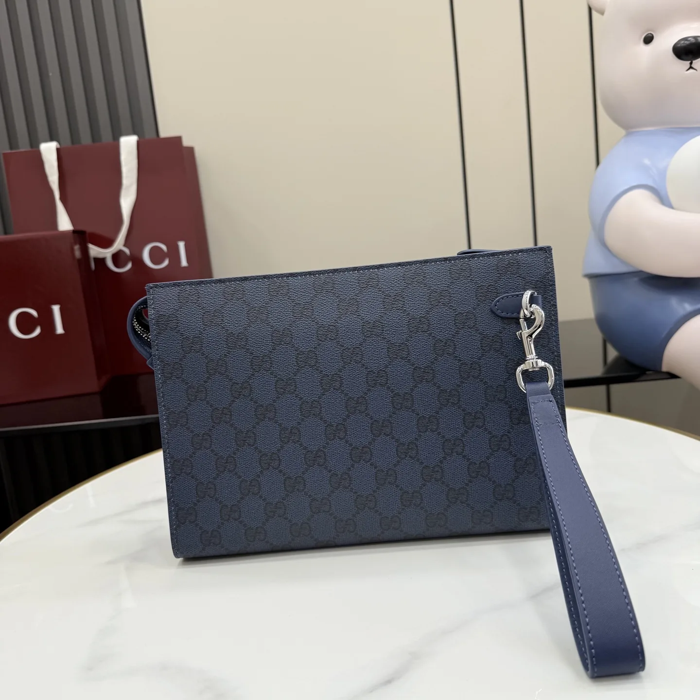 Gucci Navy GG Supreme Canvas Clutch product photo from LabelPicks
