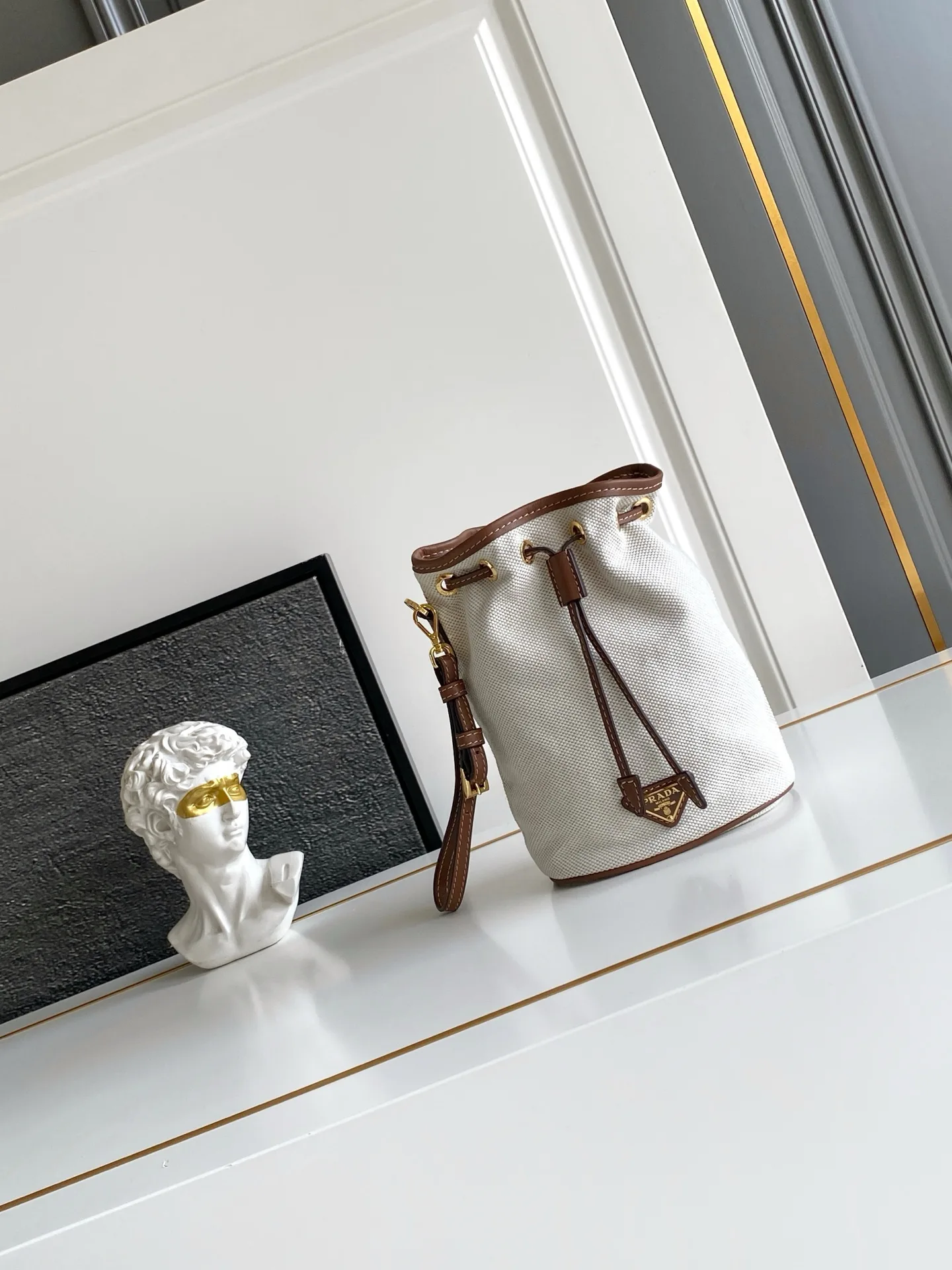 Prada Canvas and Leather Bucket Bag product photo from LabelPicks