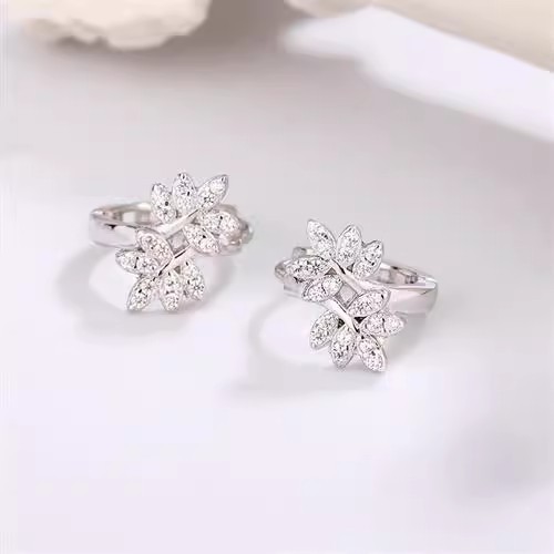 Korean-style micro-paved cubic zirconia cross-leaf earrings, a fresh, unique, and versatile design featuring delicate leaf motifs and individual branch-shaped hoops