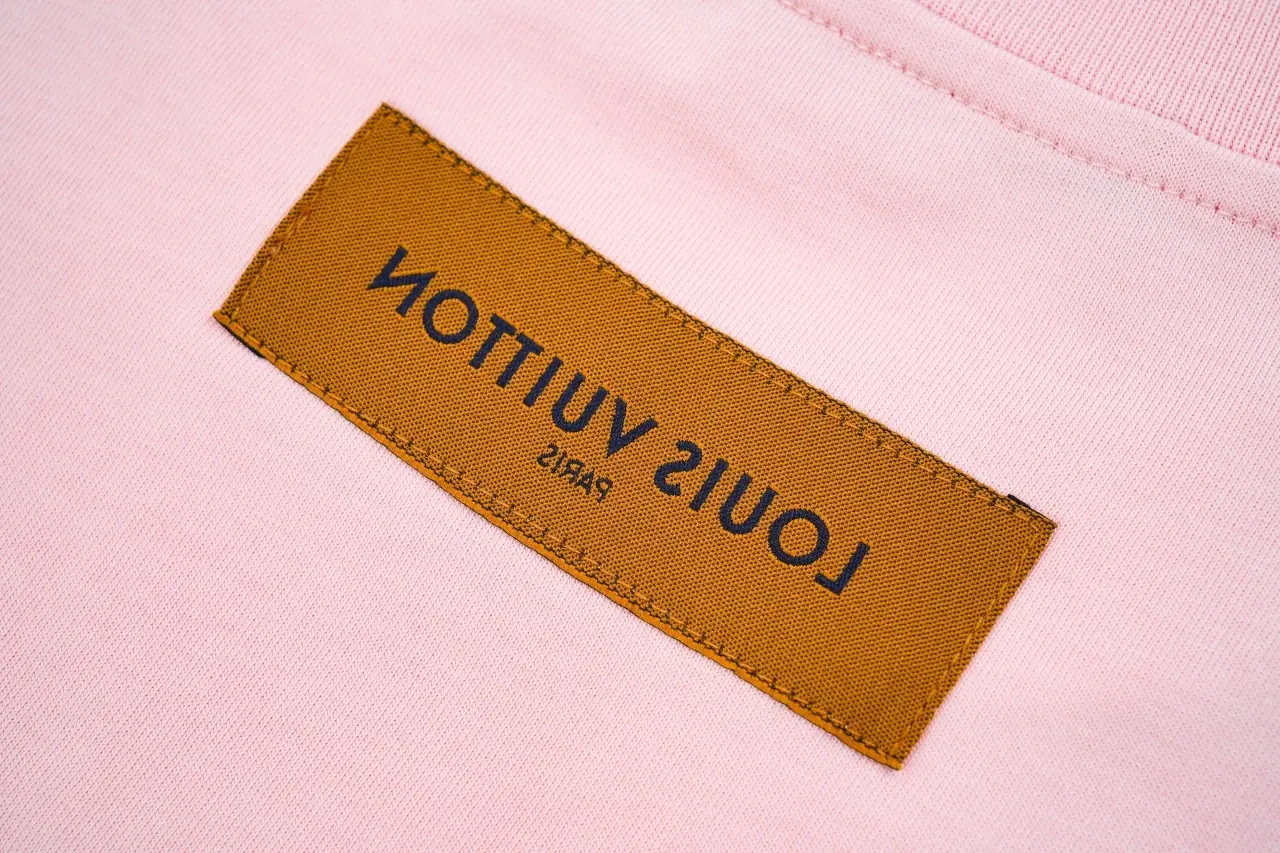 Louis Vuitton Pink Embossed Logo T-Shirt product photo from LabelPicks