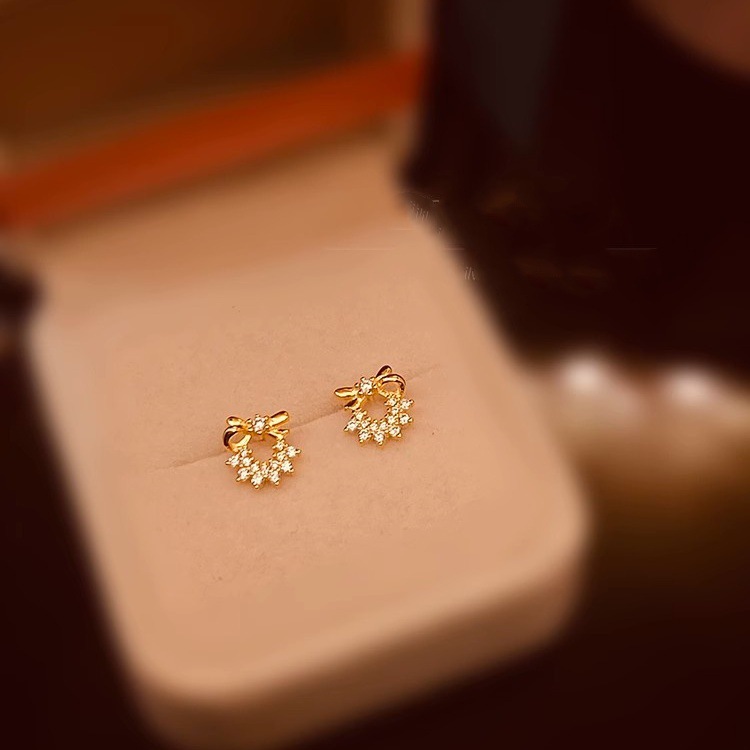 Korean-style, lightweight luxury S925 sterling silver butterfly knot star ring earrings, women's silver needle earrings, niche design, high-end earrings