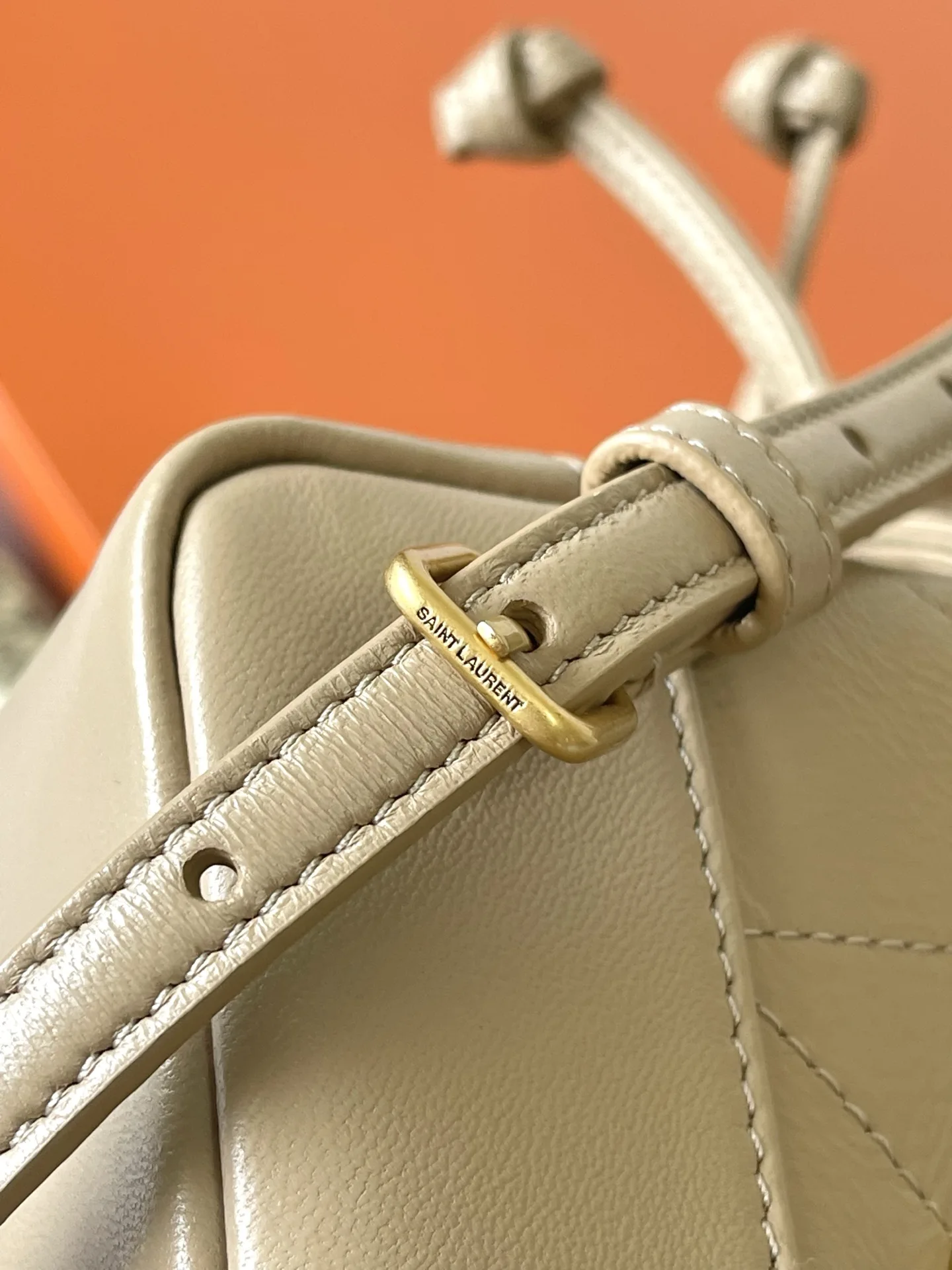 Saint Laurent Jamie Beige Lambskin Bucket Bag product photo from LabelPicks
