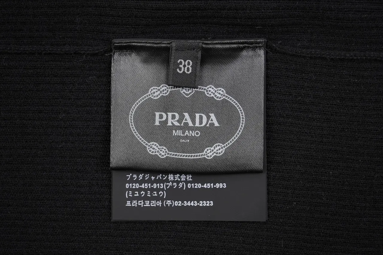 Prada Black Gold Logo Embroidered Half-Sleeve Knit Top product photo from LabelPicks