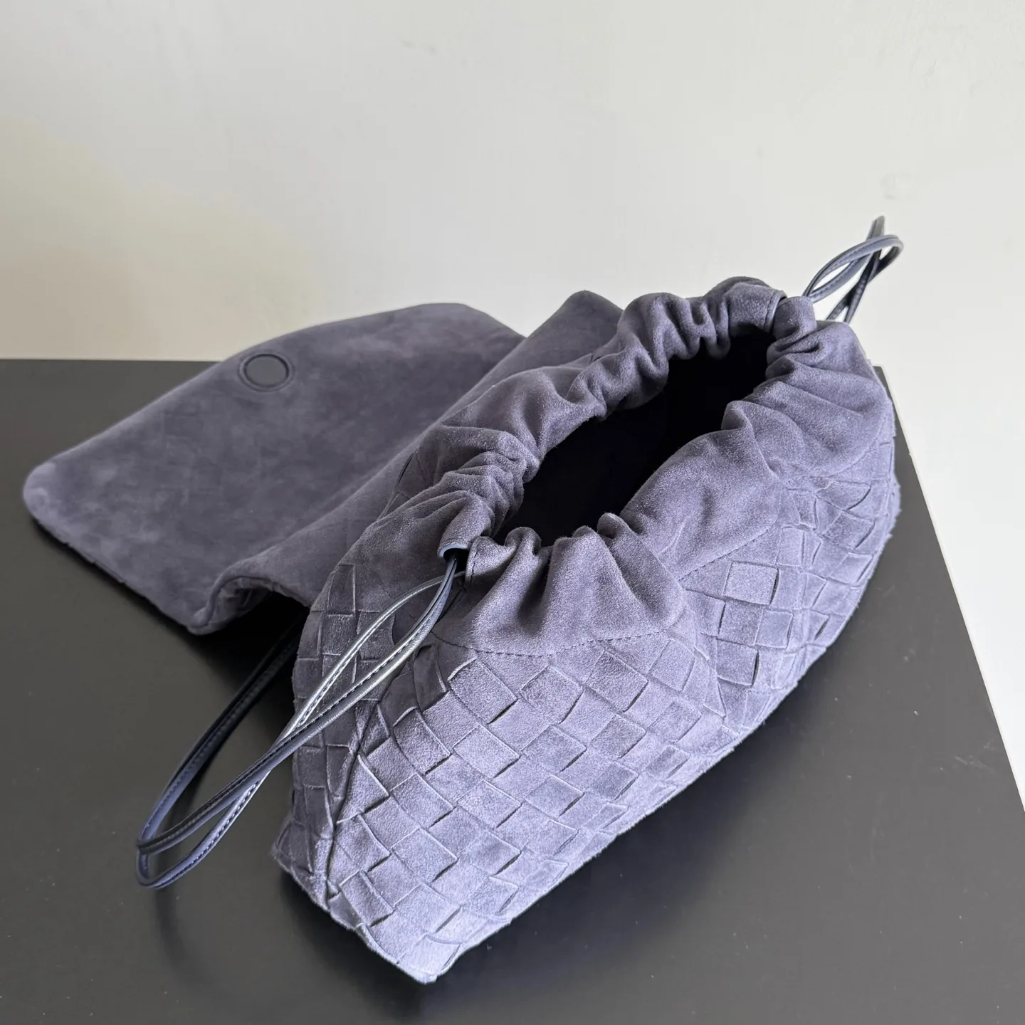 Bottega Veneta Dustbag Intrecciato Woven Leather Clutch product photo from LabelPicks