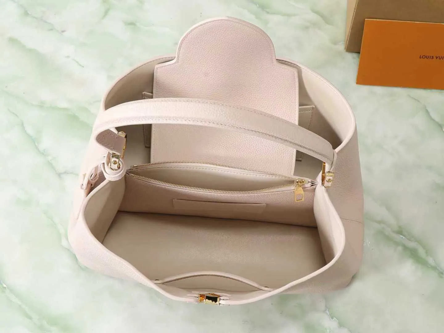 Louis Vuitton Capucines Pink Calfskin Top Handle Bag product photo from LabelPicks
