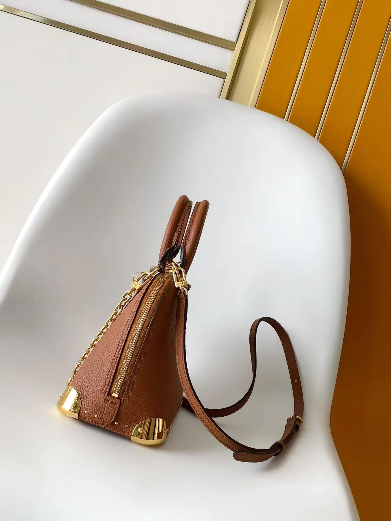Louis Vuitton Alma Canvas and Leather Top Handle Bag product photo from LabelPicks