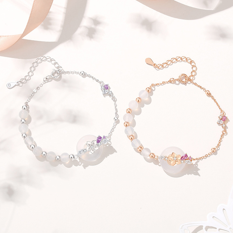 Original design: A peace knot and wisteria flower bracelet for women, made of pure silver, featuring a retro Chinese style, white jade beads, and a floral design with a forest-inspired aesthetic