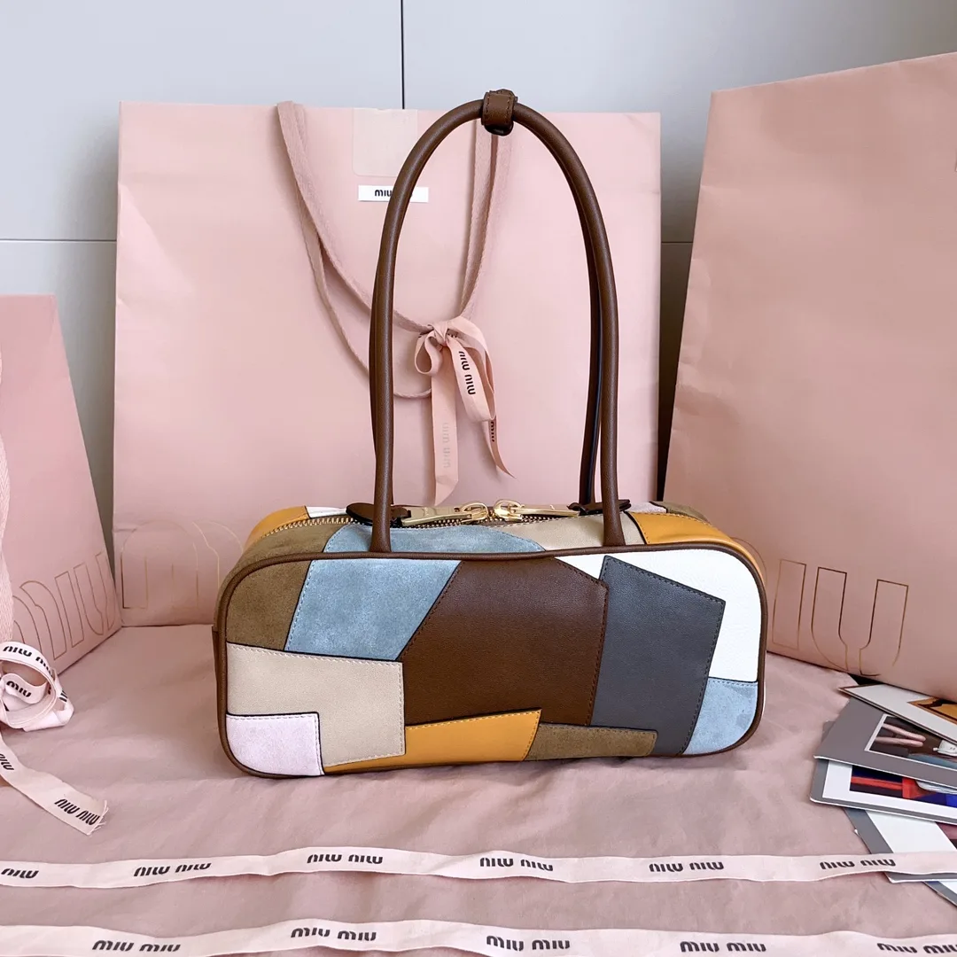 Miu Miu Canvas and Leather Top Handle Bag product photo from LabelPicks