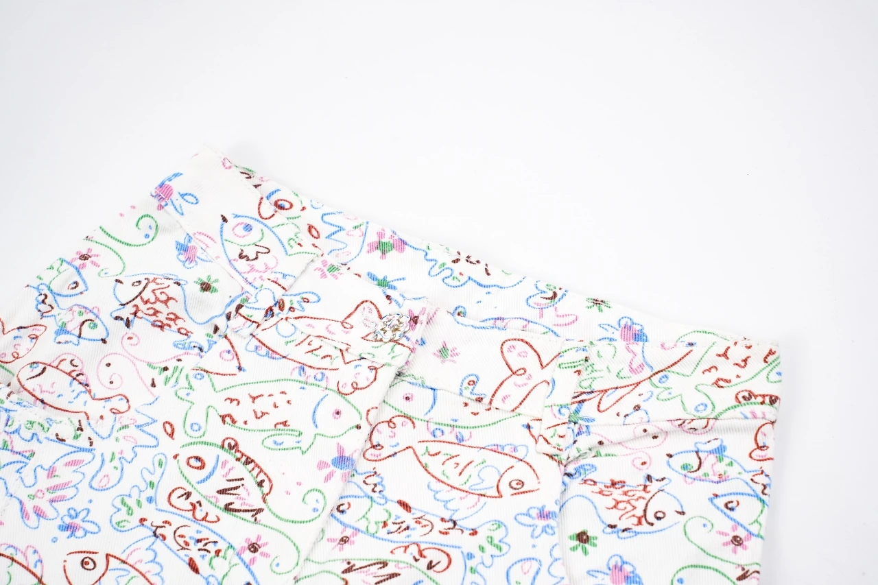 CHANEL Cream White Graffiti Straight-Leg Jeans product photo from LabelPicks