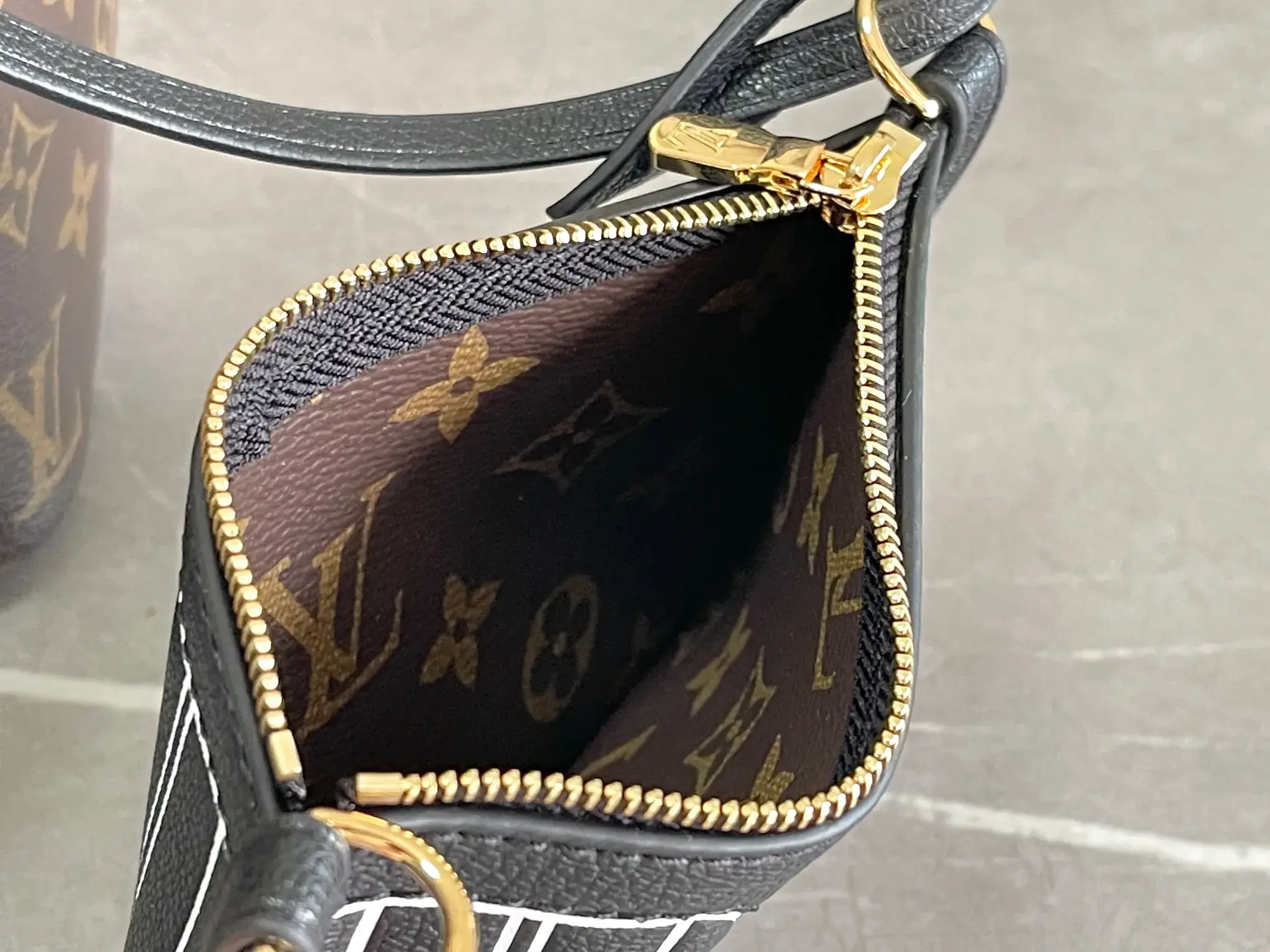 Louis Vuitton Neverfull Black Grained Leather Shoulder Bag product photo from LabelPicks