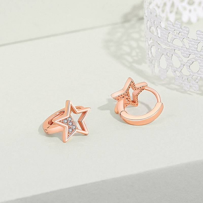 Five-pointed star earrings, made of 925 sterling silver, featuring a hollow star design, perfect for a youthful and trendy summer look. These simple and versatile earrings are a must-have accessory