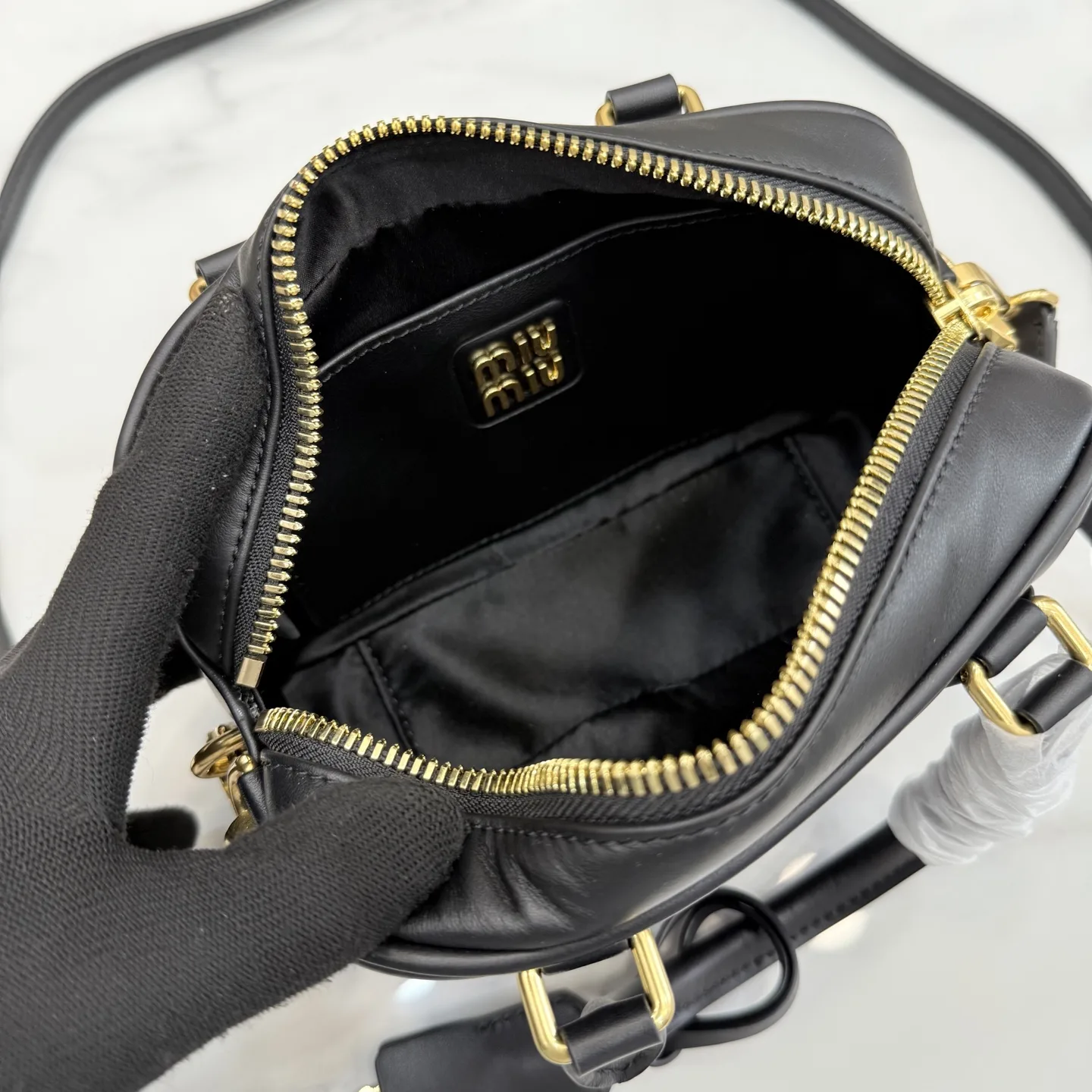 Miu Miu Matelasse Black Calfskin Top Handle Bag product photo from LabelPicks