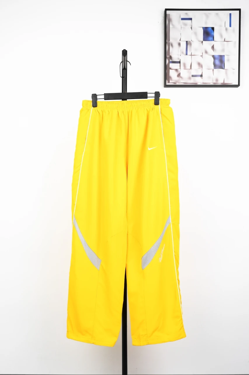 Nike Bright Yellow Swoosh Track Pants product photo from LabelPicks