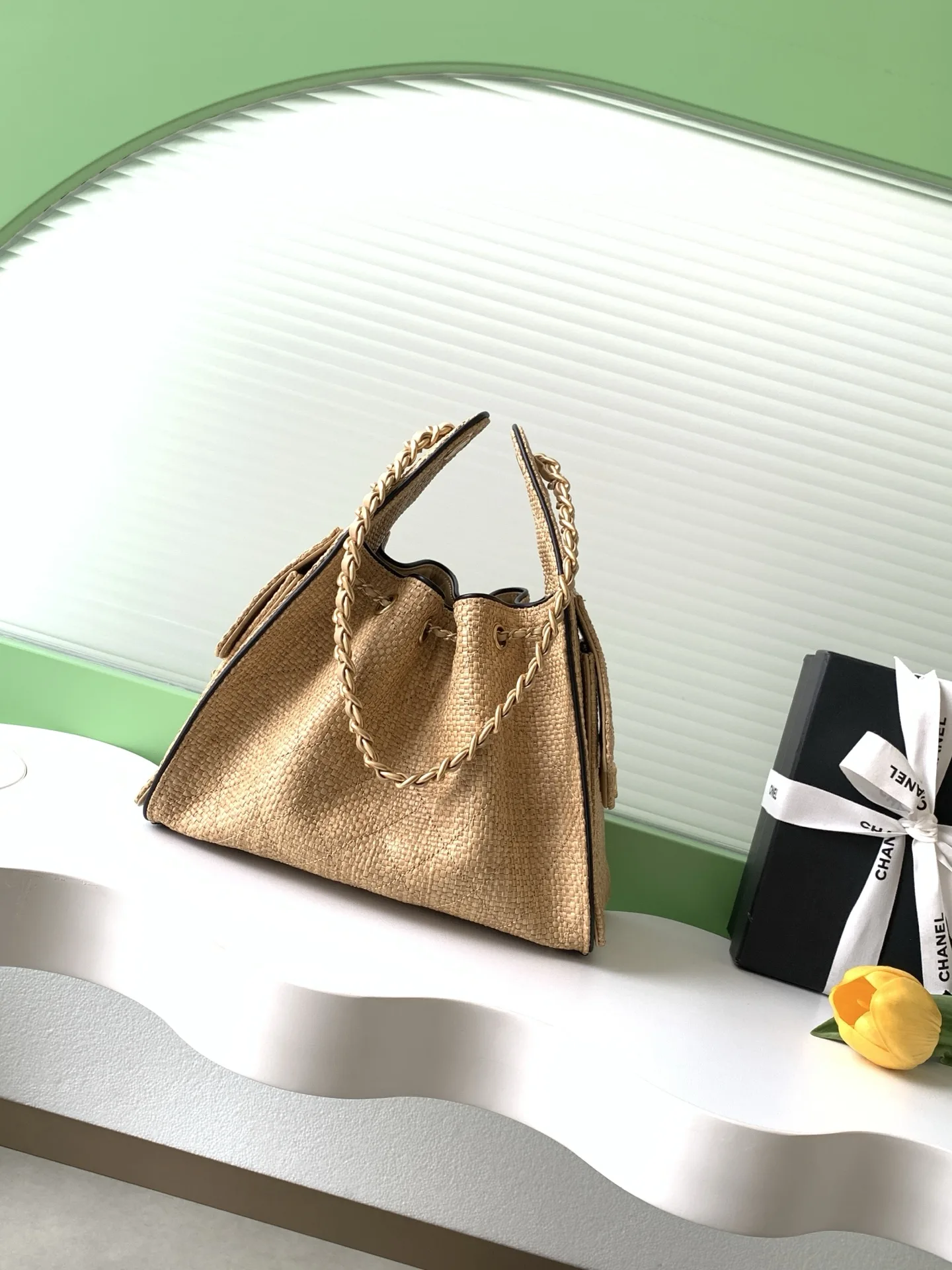 Chanel Black Straw Woven Bucket Bag product photo from LabelPicks