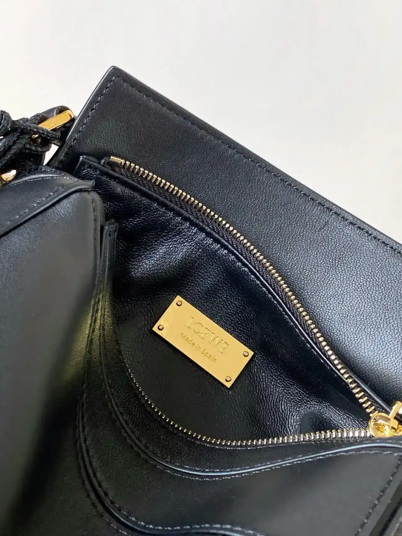 Loewe Puzzle Black Lambskin Top Handle Bag product photo from LabelPicks