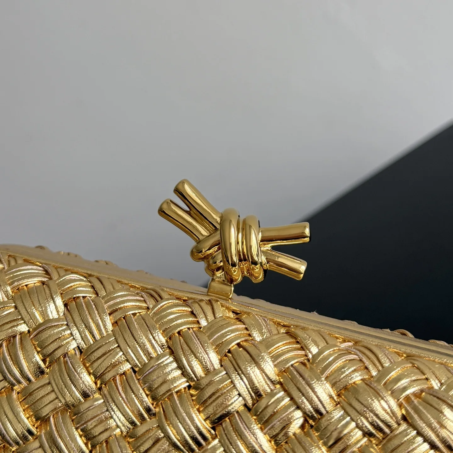 Bottega Veneta Intrecciato Woven Leather Knot Clutch product photo from LabelPicks