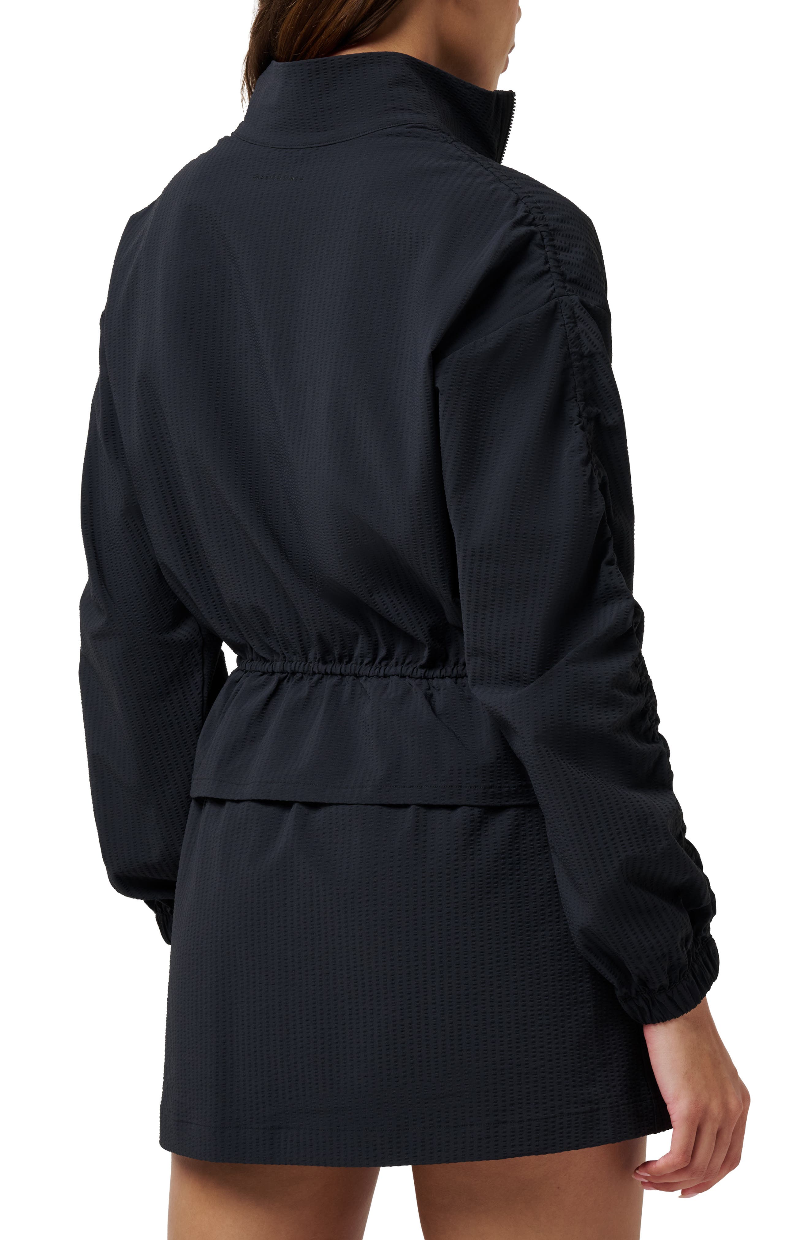 TravisMathew Timeless Breezeblend Peplum Jacket
