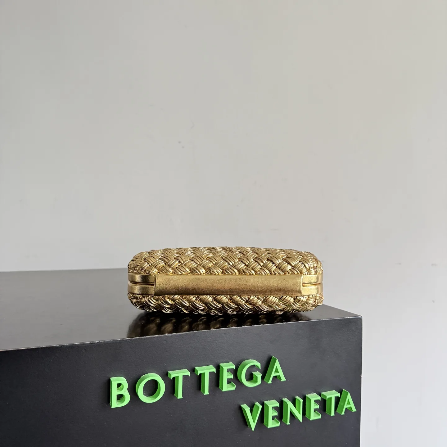 Bottega Veneta Intrecciato Woven Leather Knot Clutch product photo from LabelPicks
