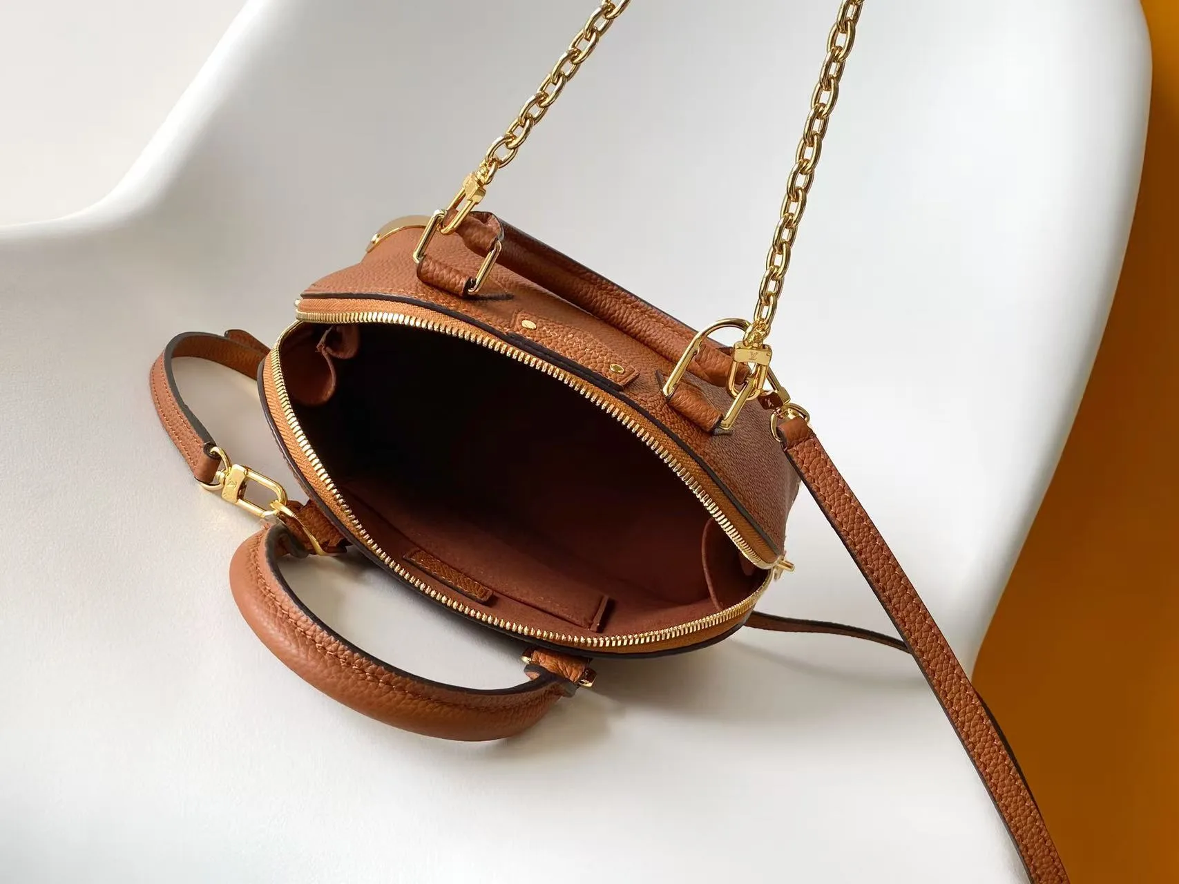 Louis Vuitton Alma Canvas and Leather Top Handle Bag product photo from LabelPicks