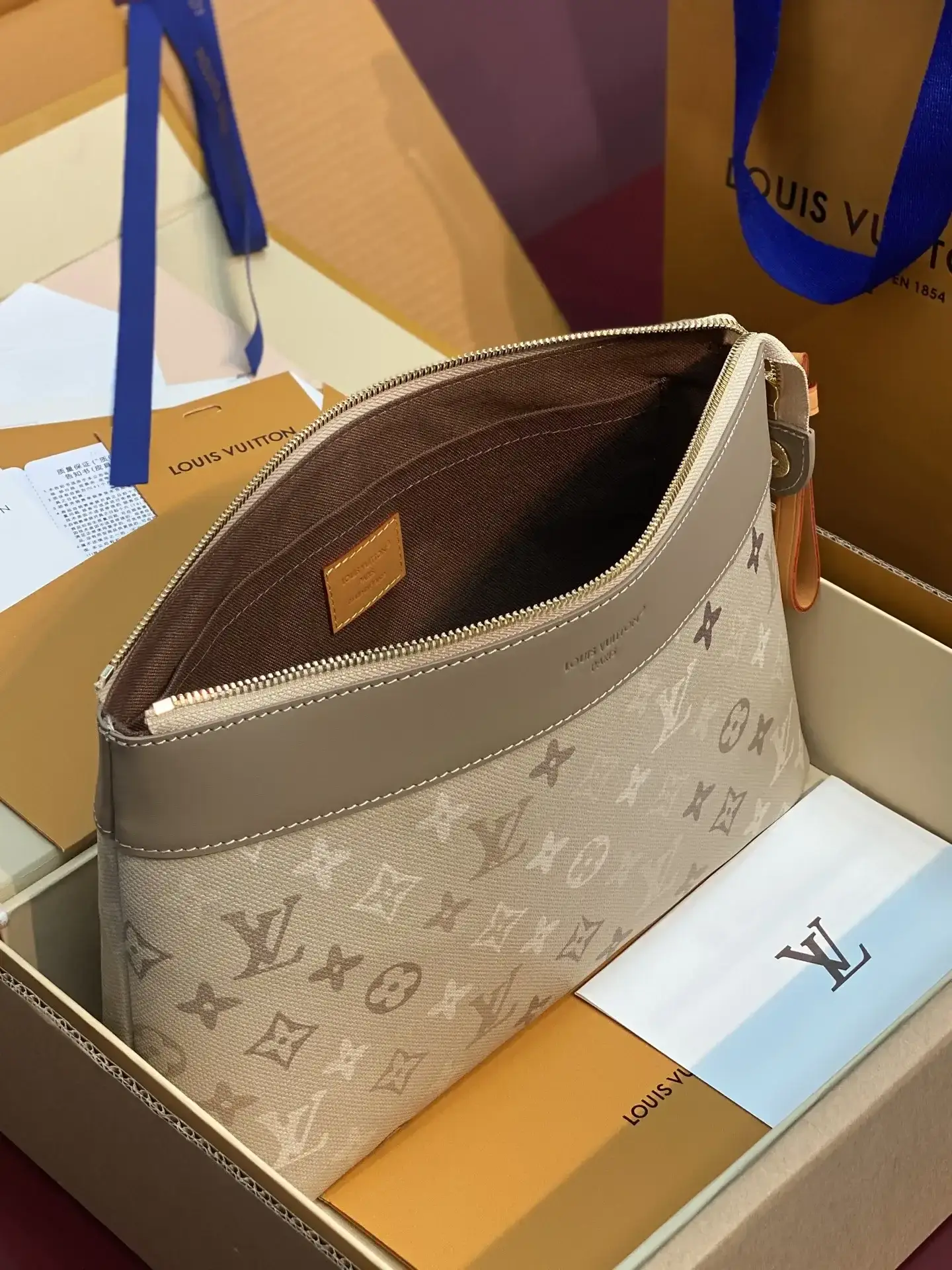 Louis Vuitton Red Pochette Canvas and Leather Clutch product photo from LabelPicks